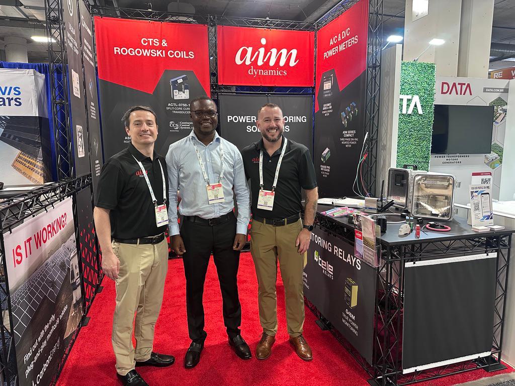 AIM Dynamics team at an expo booth
